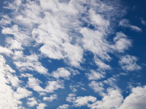 Blue sky with white clouds useful as a background