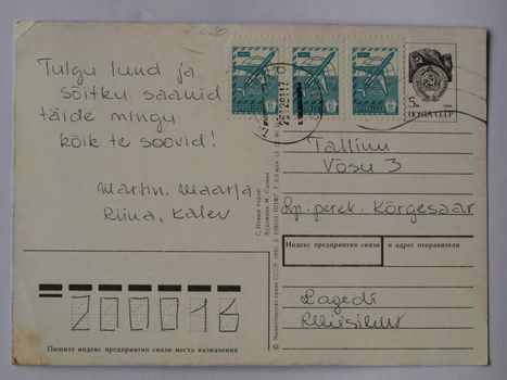 TALLINN (ESTONIA, FORMER USSR), CIRCA 1976: old postcard written in Estonian language and with USSR stamp sent form Tallinn, Estonia (then a state of the former USSR) in 1976