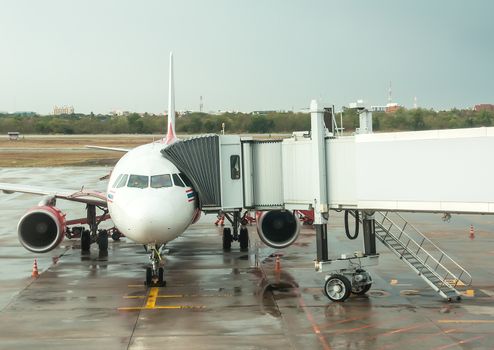 aerobridge in plane parked at Udon Thani Airport  in thailand