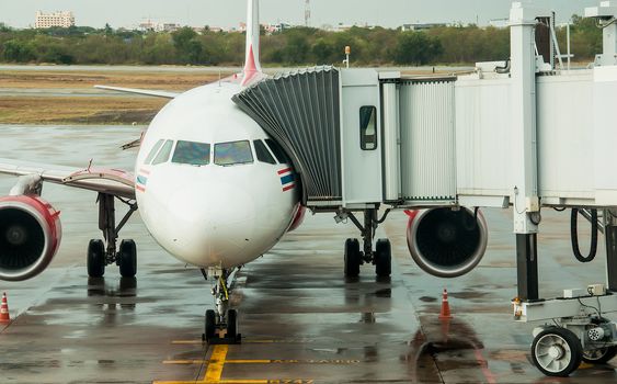 aerobridge in plane parked at Udon Thani Airport  in thailand