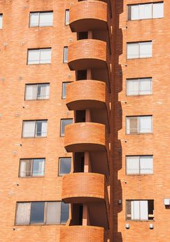 Orange building for a residence and business.