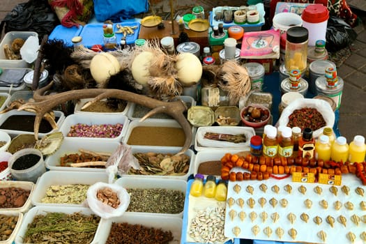 Food Stalls with medicinal plants, herbs, and roots in Djemaa el Fna, Marrakesh, Morocco