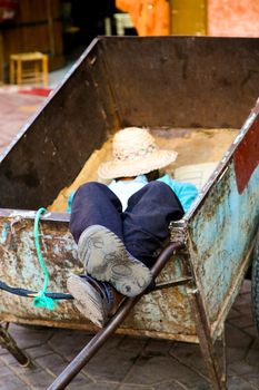 Man sleeping in the old medina of Marrakesh