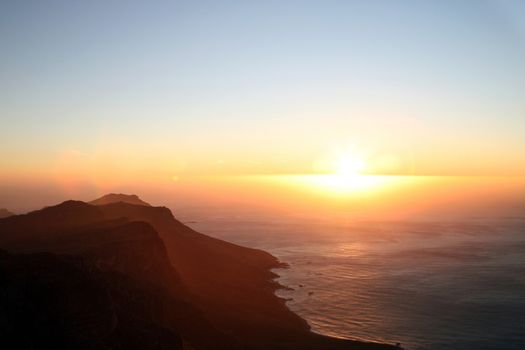 Sunset on the Table mountain in Cape Point - Good Hope and the atlantic ocean