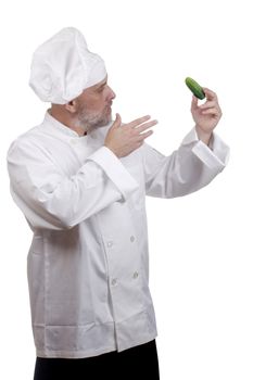 Talk chef with a cucumber, a humorous picture.
