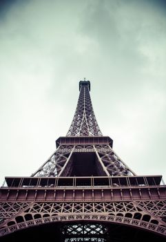 Low angle of the Eiffel Tower in Paris, France. Toned image