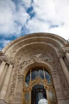 Doors of the Grand Palais in Paris against a blue sky, France