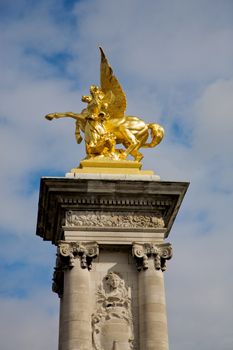 Angel statue on Pont Alexandre in Paris, France