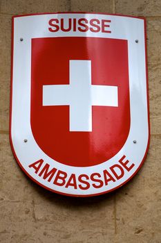 Swiss sign on the wall of the embassy in Paris, France