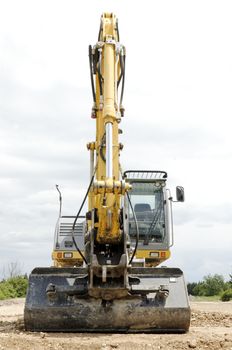 excavator on construction site, industrial tool