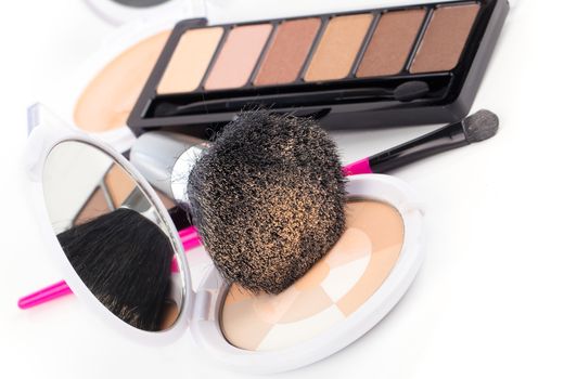 compact powder and black brush isolated