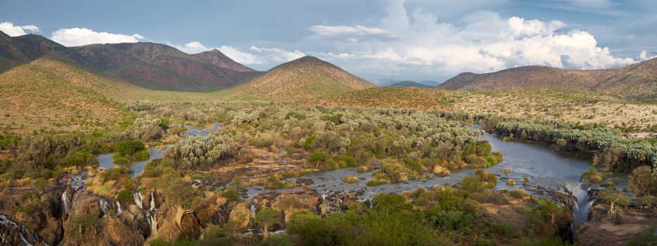 The Epupa Falls are created by the Kunene River on the border of Angola and Namibia, in the Kaokoland area of the Kunene Region.