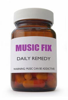 Pills container labeled with music fix 