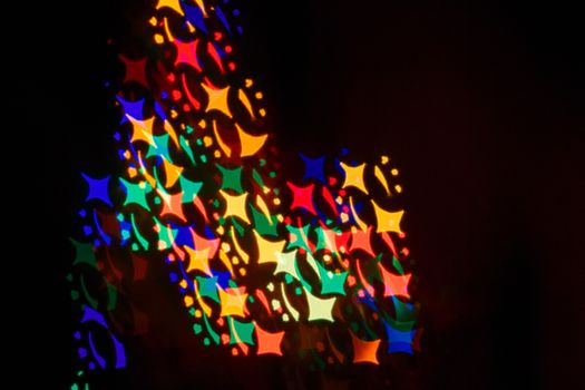 Multicolored abstract bokeh background close up shot for the holidays