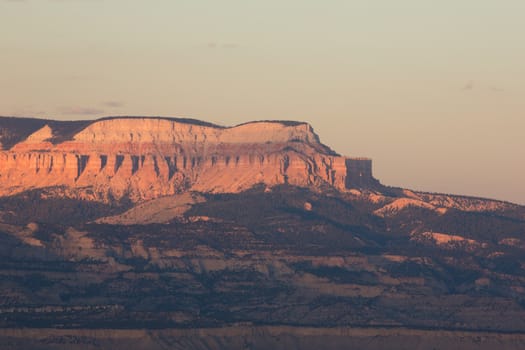 Panoramic view to one of the amphitheatres of Bryce Canyon late afternoon with sunset