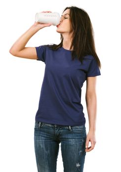 Photo of a beautiful brunette woman with blank purple shirt drinking a takeout coffee. Ready for your design or artwork.