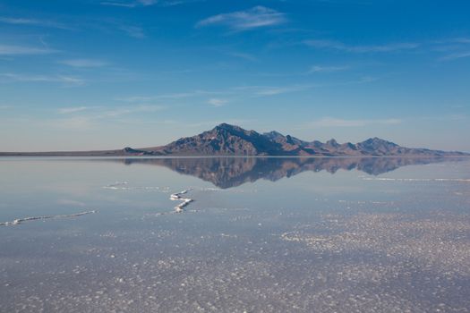 Bonneville Salt Flats International Speedway. Mystical reflection of desert mountains in sunset water