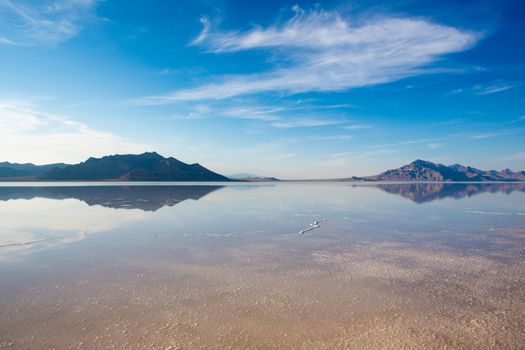 Bonneville Salt Flats International Speedway. Mystical reflection of desert mountains in sunset water