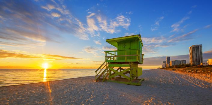 Famous Miami South Beach sunrise with lifeguard tower