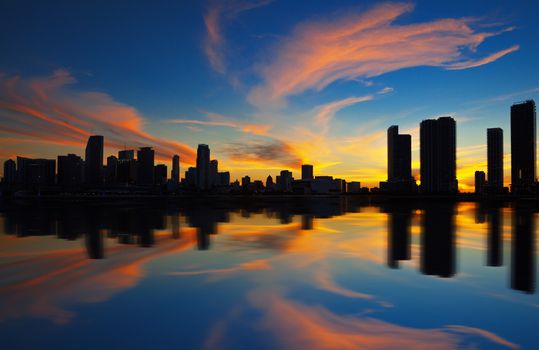 Miami city skyline panorama at dusk with urban skyscrapers