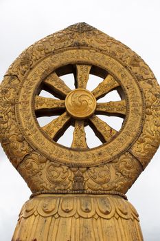 Religious gold symbol on top of a temple in Lhasa, China 2013