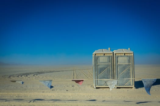 Two toilets lost in the dessert on the site of a big musical festival event in Nevada