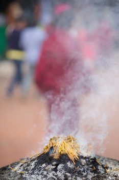 Burning incense sticks outside a temple in Kathmandu, 20 April 2013