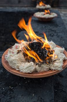 Incense sticks burning in Kathmandu temple, Nepal.