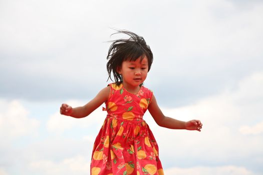 happy child outdoor jumping