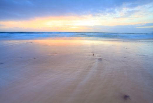 Watching the ocean in motion, stirs my emotions.   Sunrise on the Central Coast Australia.  Motion in water