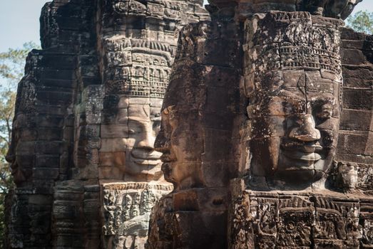 Smiling faces in Bayon Temple, Angkor, Cambodia