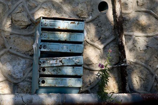 Old rusty blue mail box in Balaklava, Ukrain 