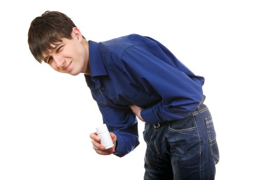 Young Man with white bottle of the medical product feels Stomachache