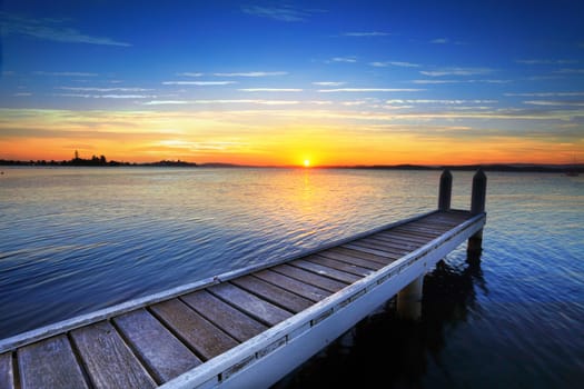 Setting sun serenade me as I sit and admire you for another day....  Belmont, at  Lake Macquarie on a lazy weekend summer afternoon.