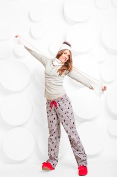 girl in studio with a scarf and hat