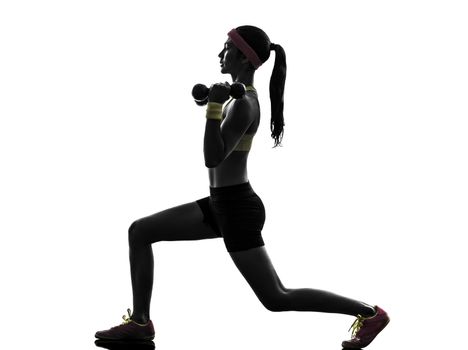 one woman exercising fitness workout lunges crouching weight training in silhouette on white background