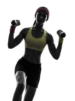 one woman exercising fitness workout weight training in silhouette on white background