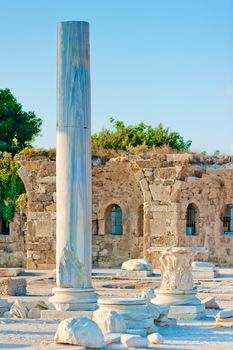 stone pillar on the background of the ancient ruined city