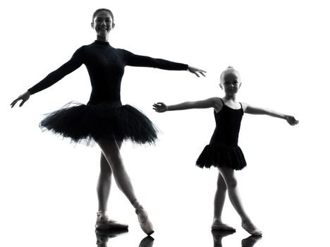 woman and little girl  ballerina ballet dancer dancing in silhouette on white background