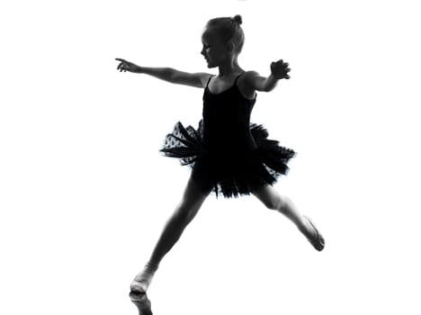 one little girl ballerina ballet dancer dancing in silhouette on white background