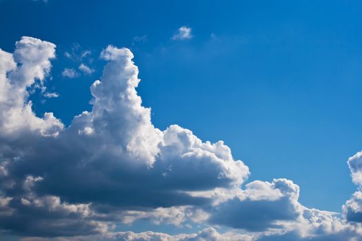 White clouds in blue summer sky background