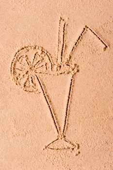 drawing in the sand glass cocktail beautifully decorated