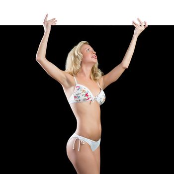 image of young attractive woman in bikini holding banner, isolated on black background