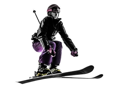one caucasian woman skier skiing jumping in silhouette on white background
