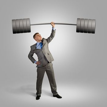 businessman holding a barbell with one hand, the concept of achievements in business