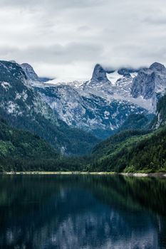 Lake and mountains view in high Alps