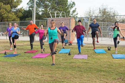European female leading diverse group in exercises