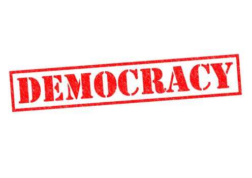 DEMOCRACY red Rubber Stamp over a white background.