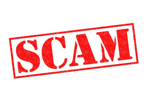 SCAM red Rubber Stamp over a white background.