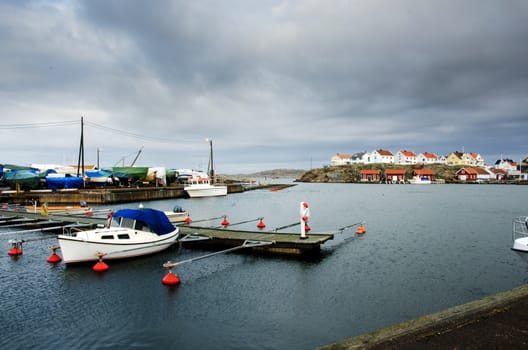 a deserted harbor an early rainy winter day